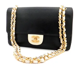 Authentic Chanel Perforated Black & White 10” 2.55 Flapover