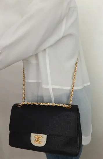 Authentic Chanel Perforated Black & White 10” 2.55 Flapover