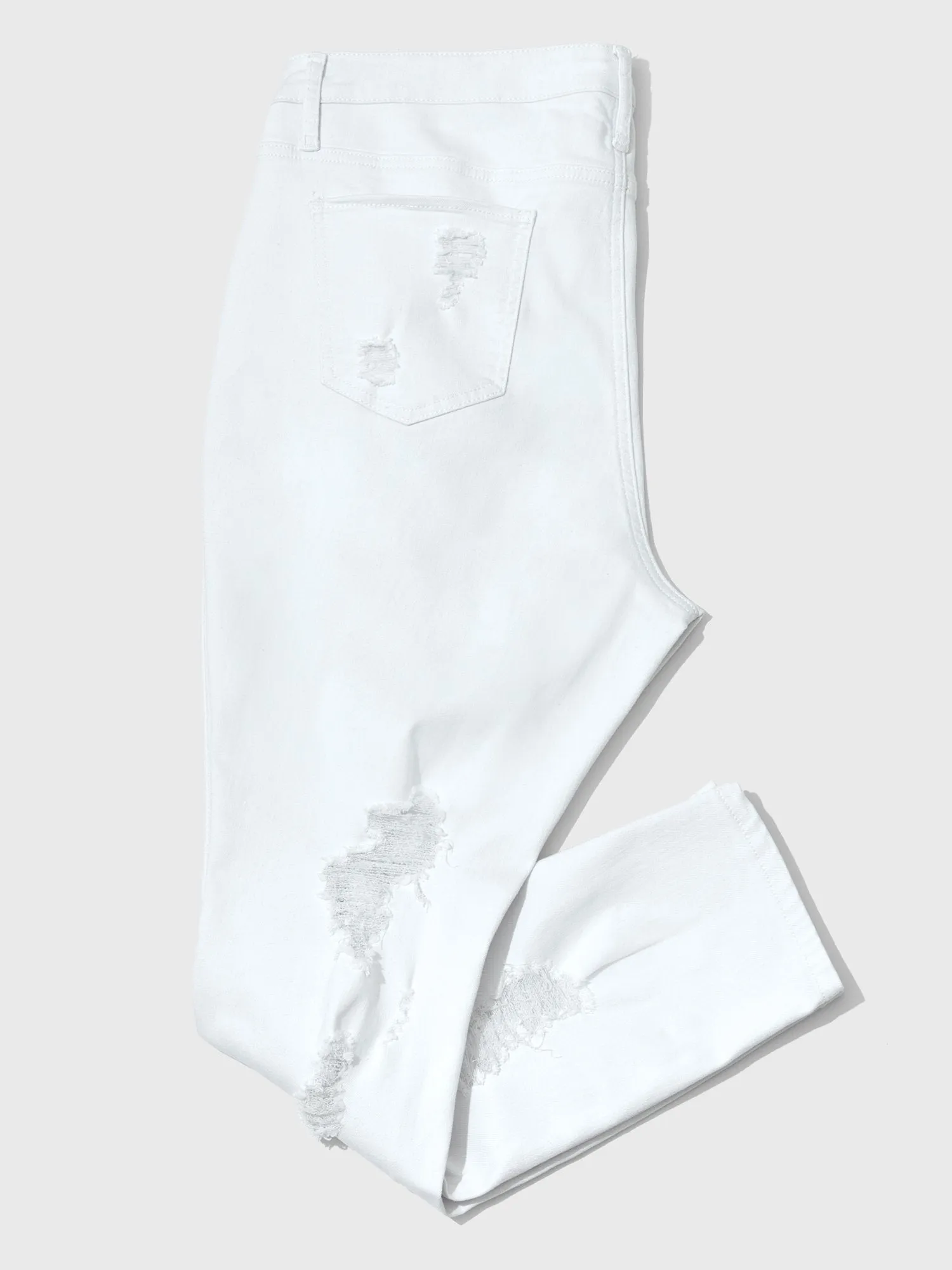 Mid-Rise All Over Destructed Skinny Jeans