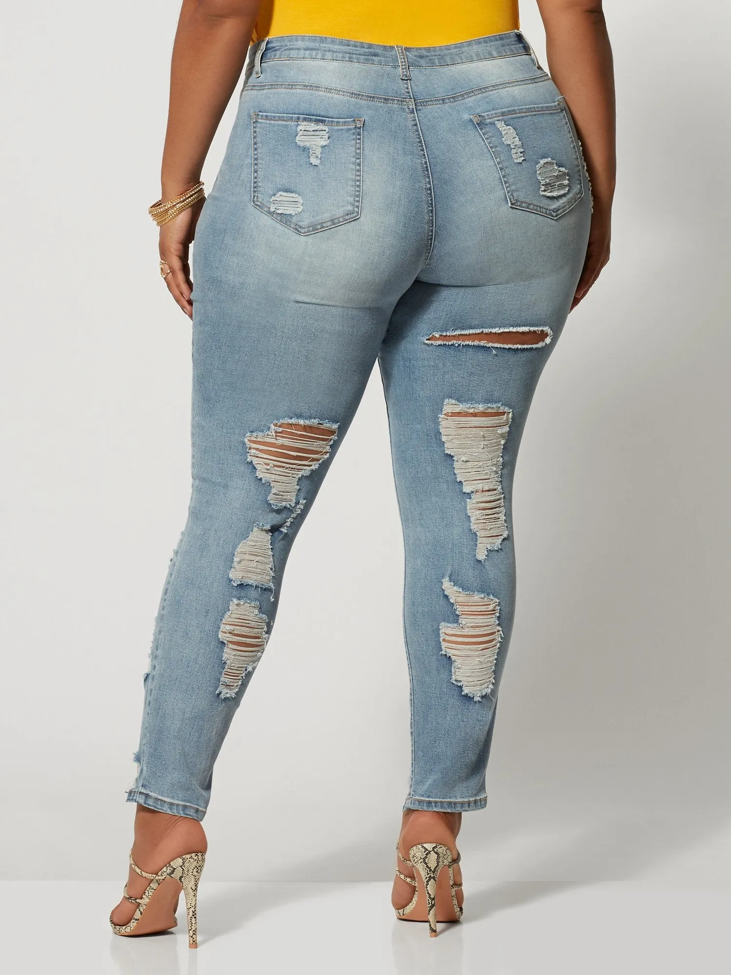 Mid-Rise All Over Destructed Skinny Jeans