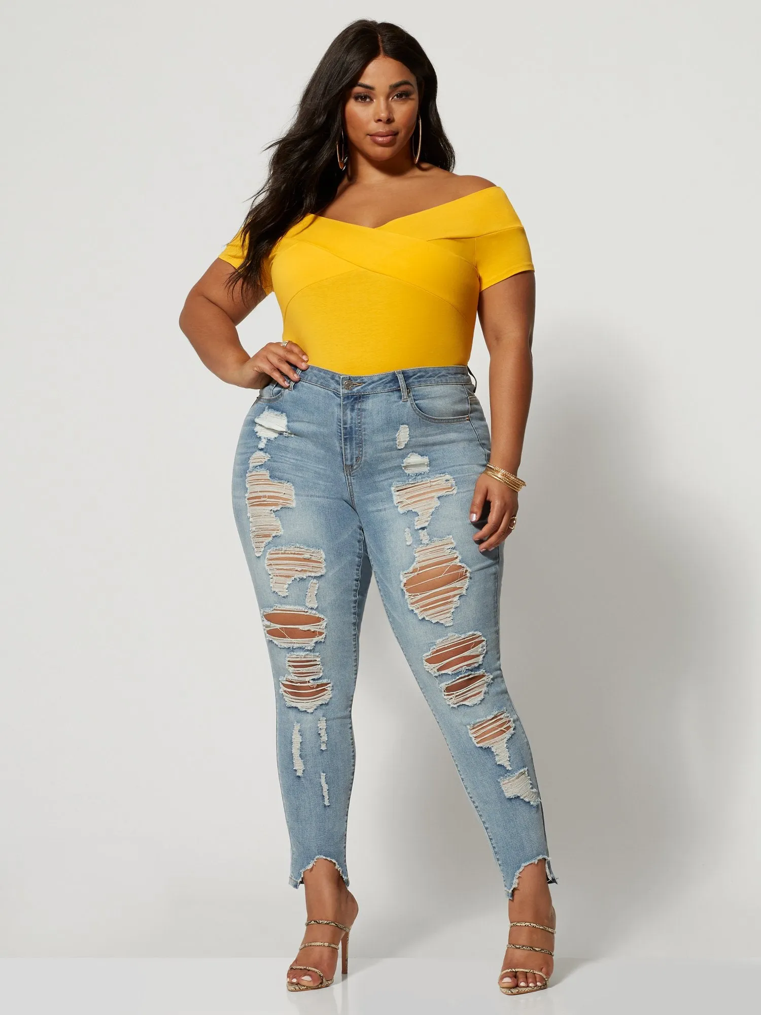 Mid-Rise All Over Destructed Skinny Jeans
