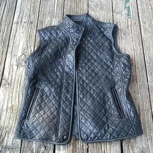 Quilted black real leather vest